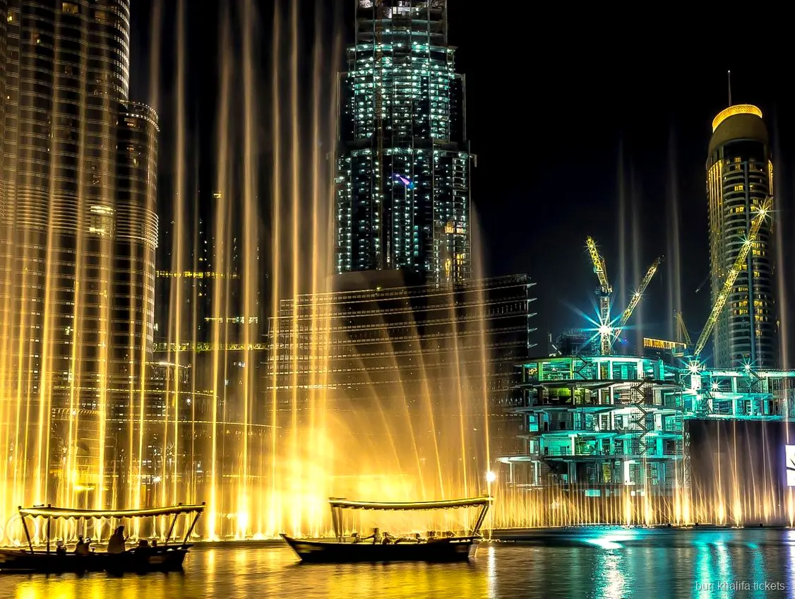 Dubai Fountain show viewed from the Burj Lake ride near the Burj Khalifa